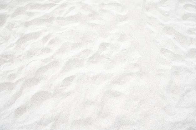 背景のビーチで白い砂のテクスチャ プレミアム写真