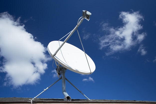 Premium Photo | White satellite dish with blue sky