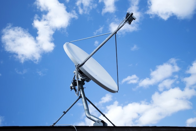 Premium Photo | White satellite dish with blue sky