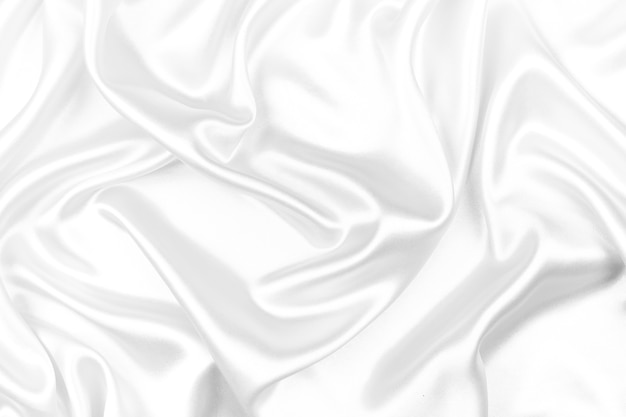 抽象的な背景の白いシルクのテクスチャ豪華なサテン ソフトフォーカス プレミアム写真