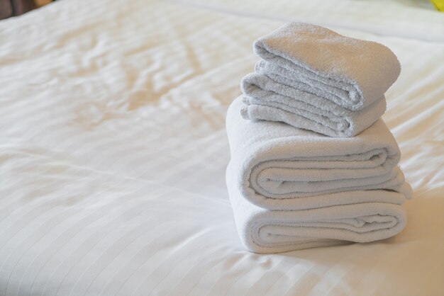 Premium Photo White Towel Fold On Bed