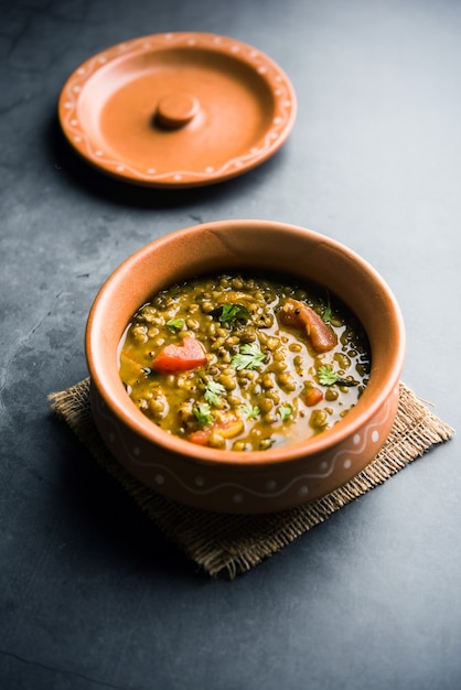 Premium Photo | Whole green moong dal fry or whole mung bean tadka ...