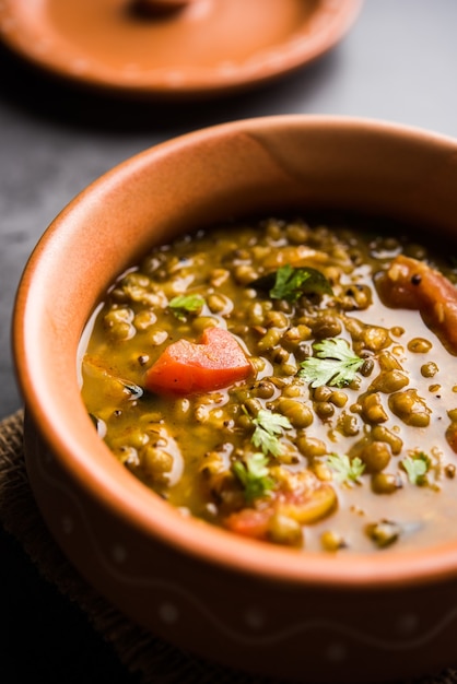 Premium Photo | Whole green moong dal fry or whole mung bean tadka ...