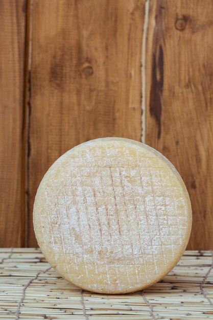 Premium Photo | Whole round partmesan or pecorino cheese head isolated ...