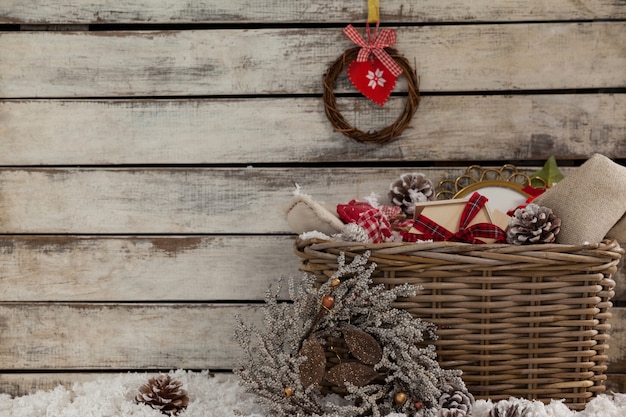 Wicker Basket With Christmas Decoration And Fake Snow Free Photo