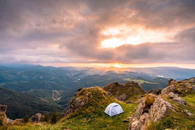 Premium Photo Wild Camping On The Top Of A Mountain At Sunset Sleeping In The Open Air After The Long Trek In The Mountains