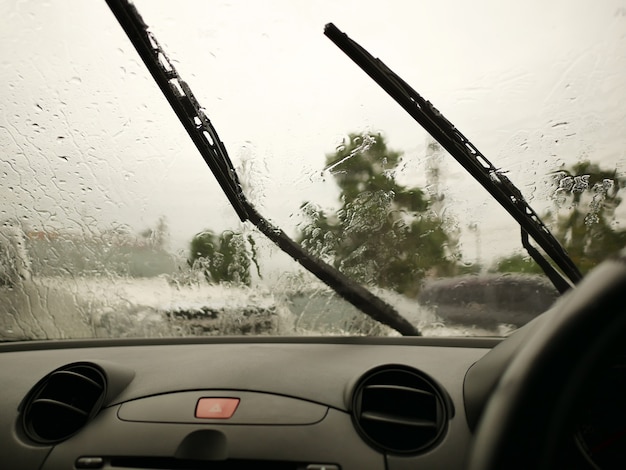 Windshield wipers from inside of car | Premium Photo