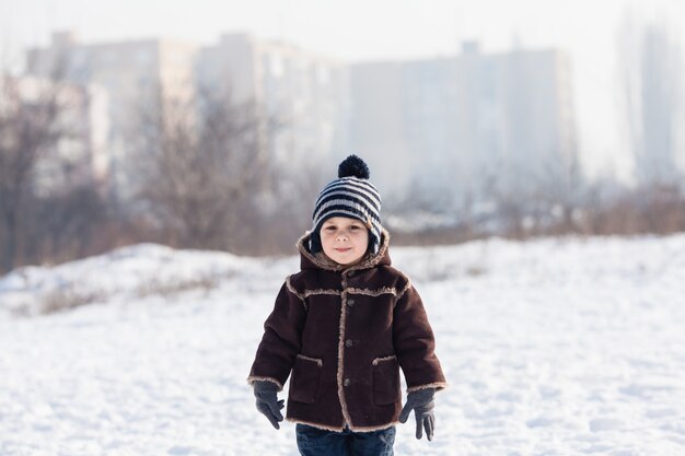 Premium Photo | Winter portrait of boy at the cold weather outdoor