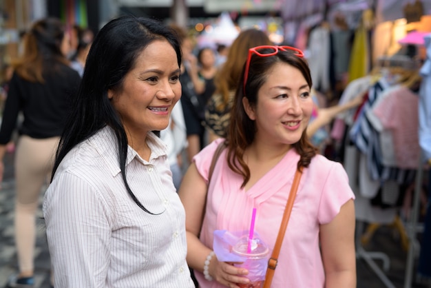 Mature asian women sexy Premium Photo Wo Mature Asian Women Shopping Together In The Street Market