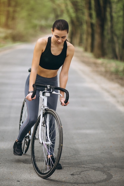 Free Photo Woman Biking In Forest