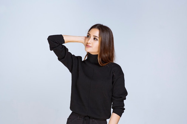 Free Photo | Woman in black shirt giving neutral and flirtatious poses.