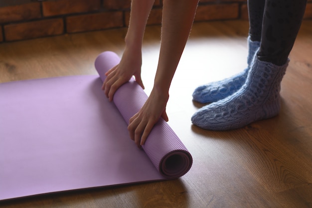 Download Free Woman In Blue Woolen Socks Turns Purple Mat Yoga And Fitness On Use our free logo maker to create a logo and build your brand. Put your logo on business cards, promotional products, or your website for brand visibility.