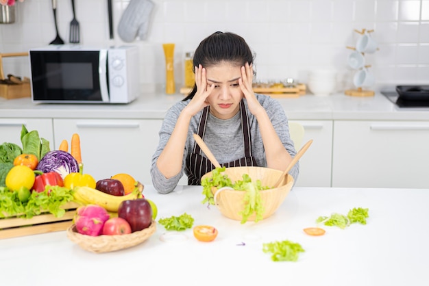 Premium Photo | Woman bored in cooking frustrated and sleepy.