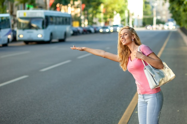 Premium Photo | Woman calling a taxi