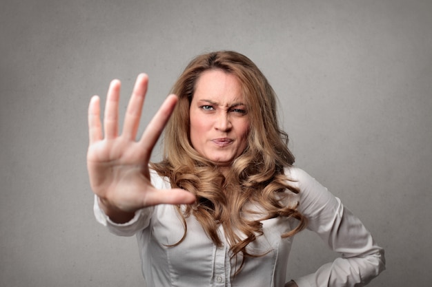 Premium Photo | Woman doing gesture of rejection