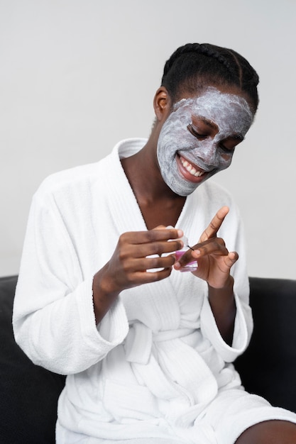 Woman doing a self care treatment at home Free Photo