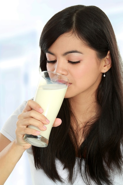 Woman Drinking Milk Premium