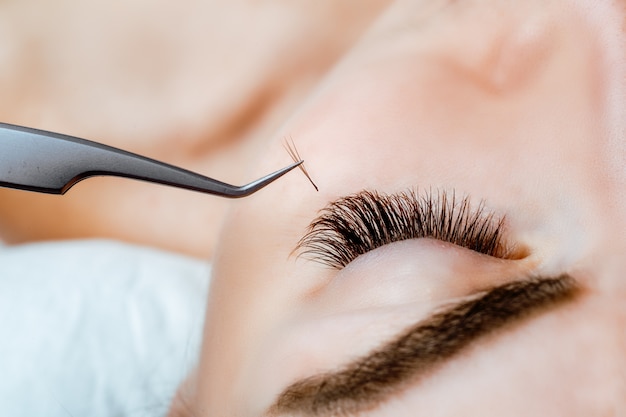 Woman eye with long eyelashes. eyelash extension. lashes, close up, Premium Photo