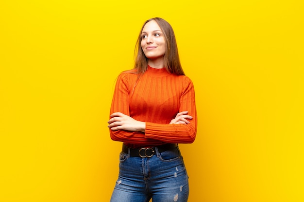 Premium Photo | Woman feeling happy, proud and hopeful, wondering or ...