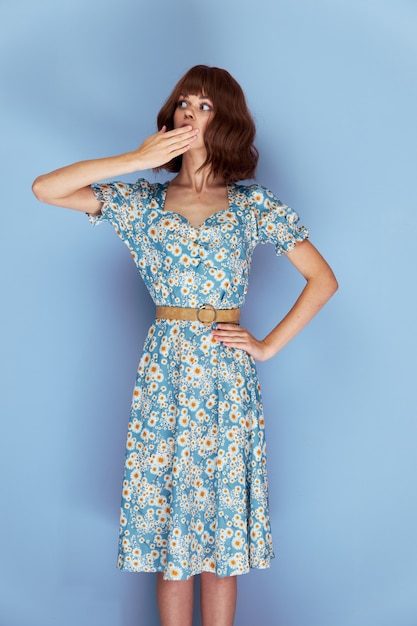 Premium Photo | Woman in flowery dress posing