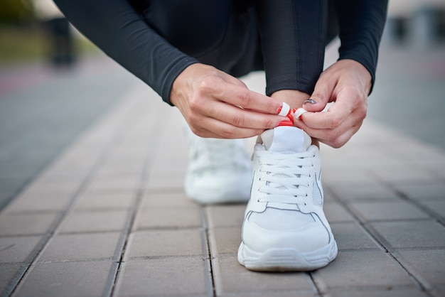 tying shoelaces