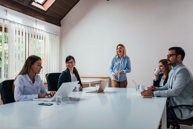 Premium Photo | Woman giving a presentation in a conference or a meeting.