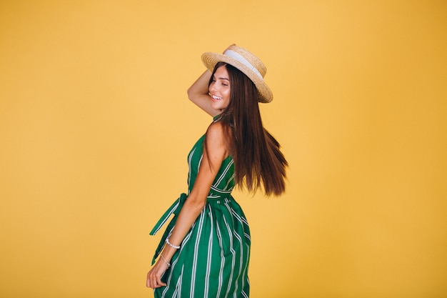 woman-green-dress-hat-yellow-background_1303-10554.jpg (626×417)