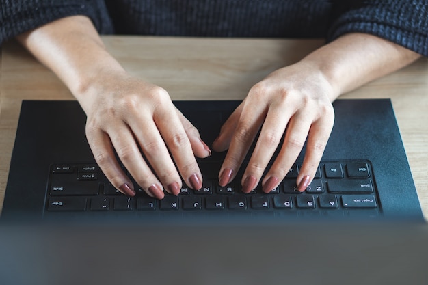 Premium Photo | Woman hand typing on keyboard computer laptop