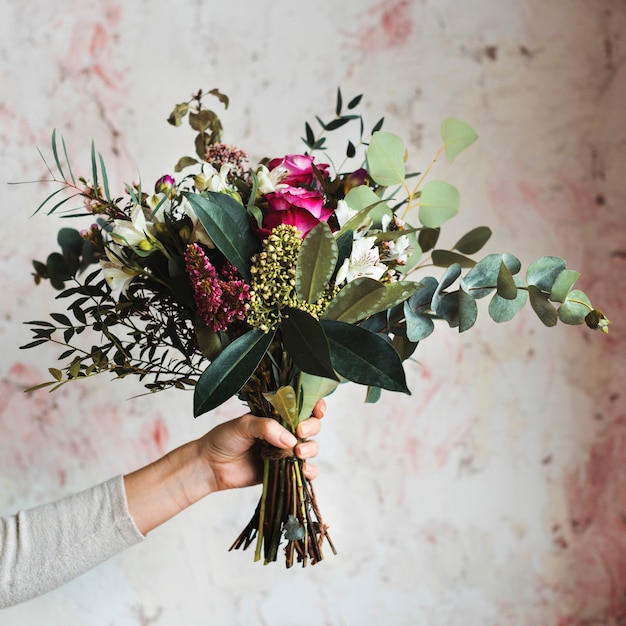 Premium Photo | Woman hands holding beautiful flowers bouquet