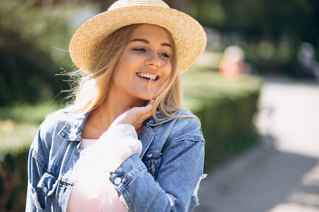 Free Photo | Woman happy in hat outside the street