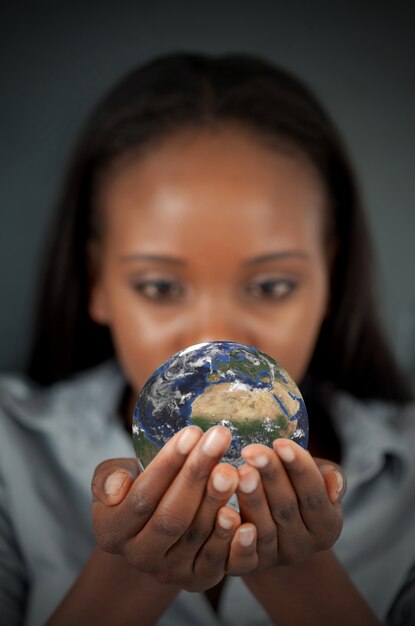 Premium Photo Woman Holding The Earth