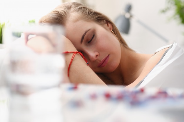 Premium Photo Woman Is Ill Take Drugs Sleep In Bed