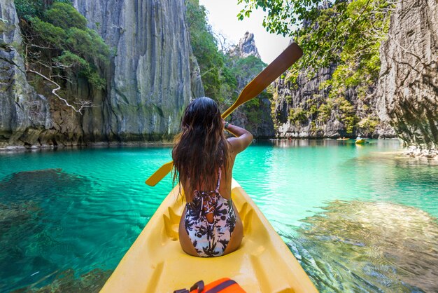 Premium Photo Woman Kayaking In The Small Lagoon In El Nido Palawan Philippines Travel Blogger Exploring South East Asia Best Places