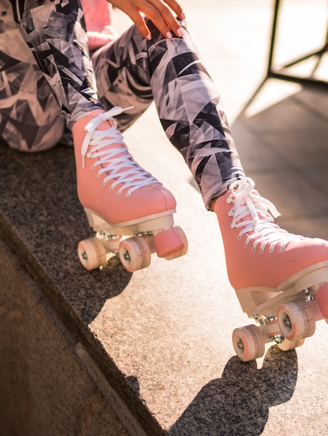 Free Photo | Woman in leggings posing with roller skates