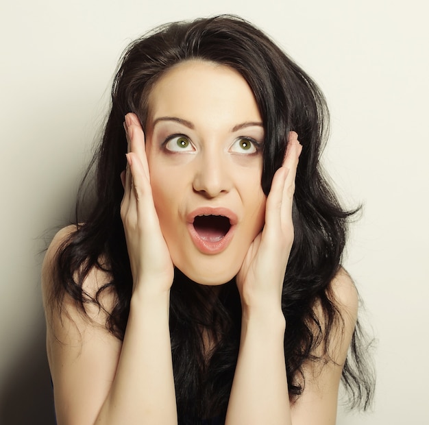 Premium Photo | Woman making a funny face.studio shot.