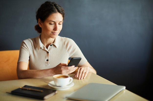 Premium Photo | Woman messaging