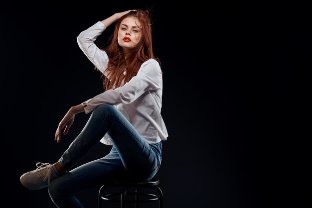 Premium Photo Woman Model In Jeans And A White Shirt Posing