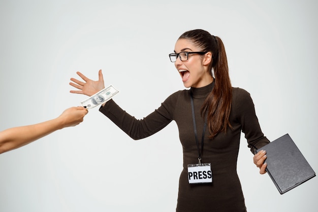 Free Photo | Woman offended person giving her bribe, shouting