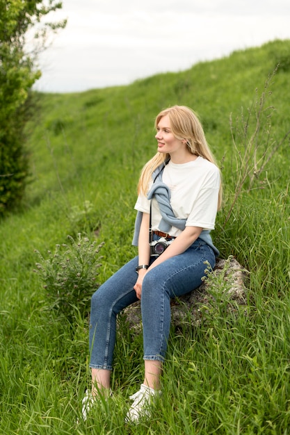 Free Photo | Woman posing in grass