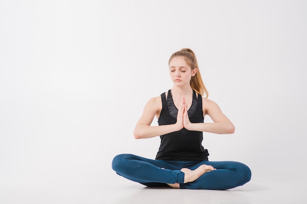 Free Photo | Woman practicing in yoga with eyes closed