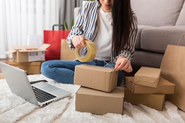 Woman preparing cyber monday packages Free Photo