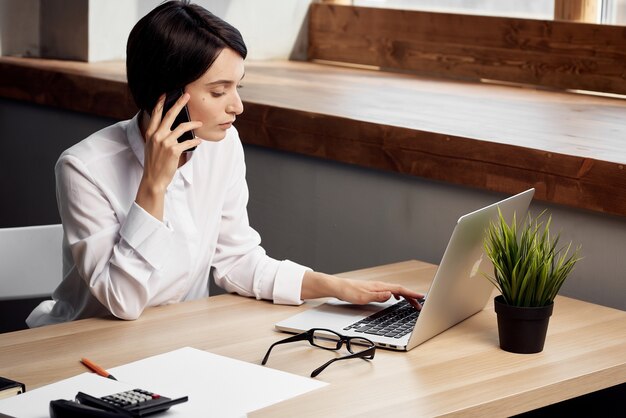 Premium Photo | Woman secretary at her desk professional office laptop