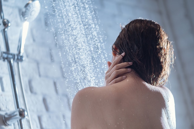 Woman in the shower Free Photo