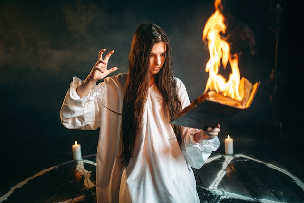 Premium Photo Woman Sitting In Burning Pentagram Circle Magic 4662