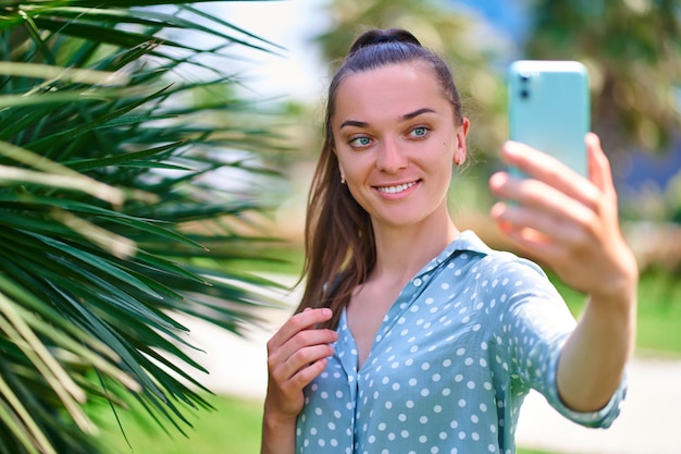 Premium Photo Woman Takes A Selfie Photo On The Phone
