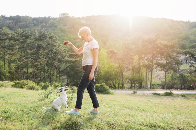 Woman training companion in the park Free Photo