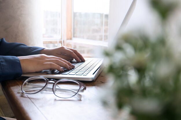 woman using laptop searching web browsing information having web searching