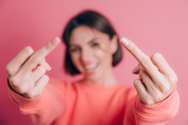 Free Photo Woman Wearing Casual Sweater On Background Showing Middle Finger Doing Bad Expression Provocation And Rude Attitude