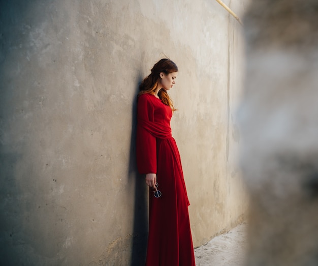 Woman wearing red dress portrait Premium Photo