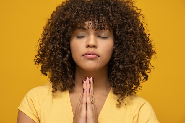 Woman With Afro Hairstyle And Yellow Top Photo Premium Download